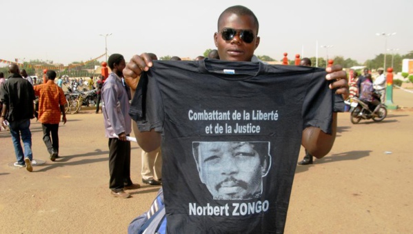Un manifestant burkinabè présent à la cérémonie du souvenir de Norbert Zongo, le 13 décembre 2014, à Ouagadougou. © Yaya Boudani / RFI.