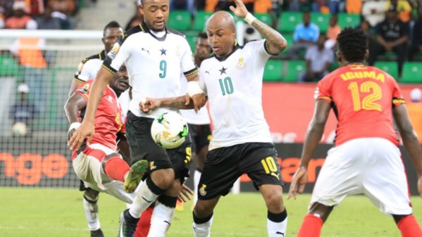 © Pierre René-Worms | Les frères Ayew en action pour le premier match des Black Stars qui l'ont emporté sur l'Ouganda 1-0.