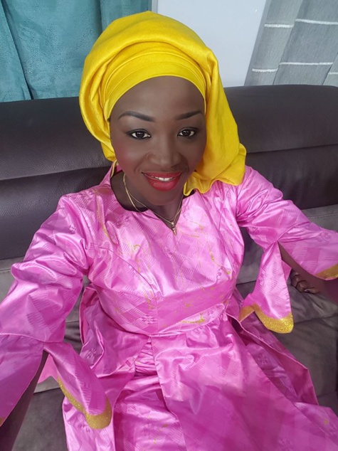 Faty Dieng de la TFM, une diongoma en mauve et jaune... 