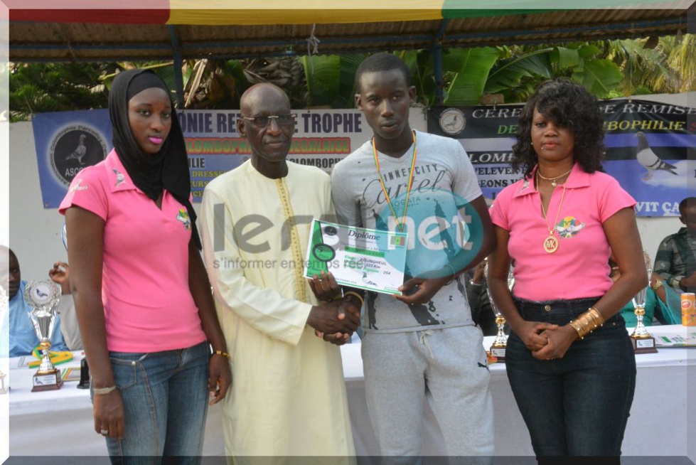 Photos : la cérémonie de remise de trophées aux lauréats 2016-2017 de la fédération sénégalaise de colombophile présidée par le RENADES avec son président Oumar Sow