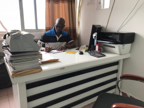 M. Diop a ses bureaux au 16e étage, Bloc C, de l’immeuble Tanxiu dans le quartier africain de Xiaobei.