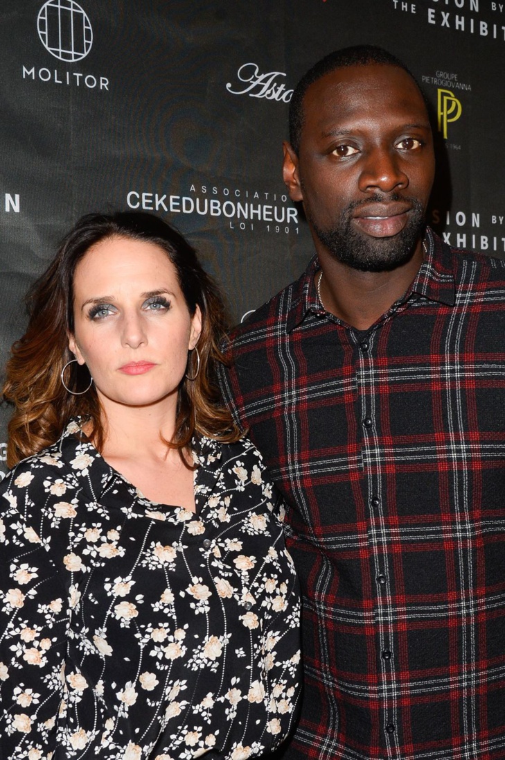 Omar Sy et sa femme Hélène au vernissage de l'exposition "Vision by AG", au profit de l'association caritative CeKeDuBonheur, à la Piscine Molitor à Paris, le 30 novembre 2016