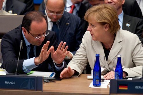 Hollande et Merkel tentent d'aplanir leurs divergences