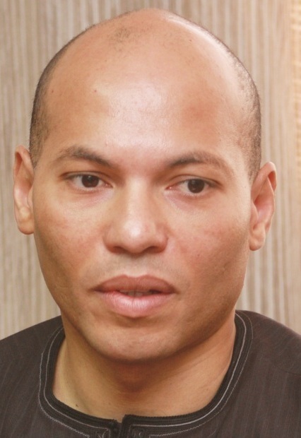 KARIM WADE DANS LE ROULEAU COMPRESSEUR