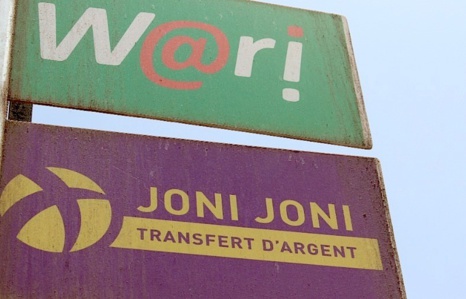 WARI, WESTERN UNION ET JONI JONI PRIS LA MAIN DANS LE SAC