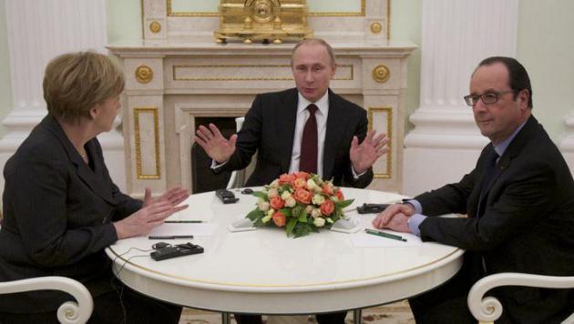 Hollande et Merkel en mission de paix au Kremlin