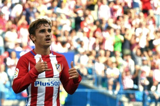 © AFP/Archives | Antoine Griezmann célèbre un but, le 17 septembre 2016 lors du match Atlético Madrid - Gijon au stade Vicente-Calderon.