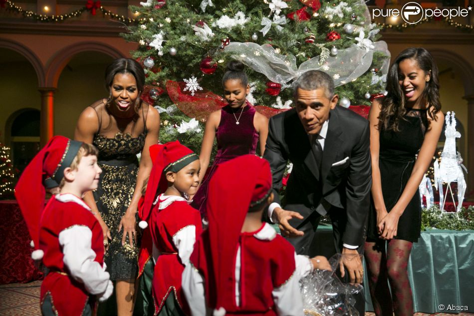 Le président Barack Obama, son épouse Michelle et leurs filles Malia et Sasha lors de l'enregistrement du concert Christmas in Washington à Washington, le 14 décembre 2014  © Abaca