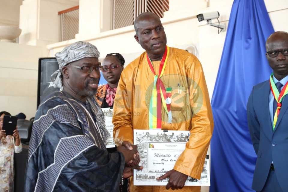 Les images de la cérémonie de remise de médaille de agents du Crédit mutuel du Sénégal