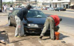 Louga : Un policier dégaine son arme à feu contre un laveur de voitures