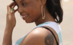 La ravissante Coumbis Sow montre son tatouage