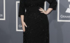 Photo : Adele affiche son ventre rond !