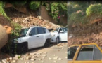 Vidéo - Lagon 1: Des voitures en miettes sous les décombres de...