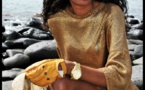 (2) Photos: Cigare à la main, Yayou Sarr en mode femme fatale. 