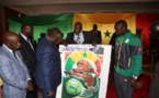 Les Lions offrent un magnifique tableau d'art au Président Macky Sall