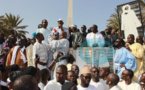 Réactions des fidèles mourides lors de la marche contre la caricature de Serigne Touba
