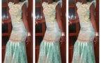 Queen Biz rayonnante dans une somptueuse robe