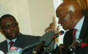 Macky Sall prudent, souhaite que Wade se retire en sa faveur