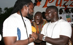 C'est la guerre des biceps entre Aladji Man et Zoss