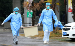 Coronavirus: la Chine confine des villes et ferme la Cité interdite