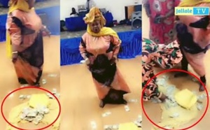 VIDEO -"Battré" spectaculaire: Une Gambienne gâte Mère Dial avec plusieurs liasses de billets