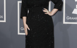 Photo : Adele affiche son ventre rond !