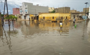 (Photos): Ndar patauge dans les eaux de pluie