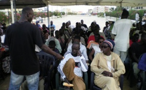 Photos:" Distribution de "ndogou" avec la Fondation Keur Rassoul