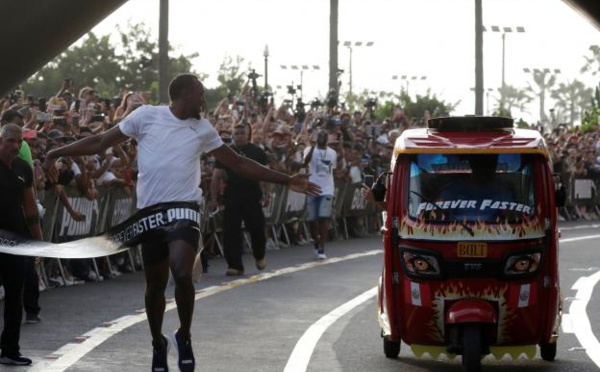 VIDEO-Quand Usain Bolt fait la course contre un moto-taxi