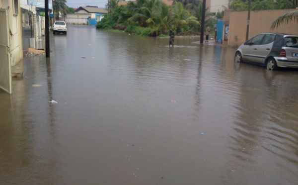 Dakar toujours sous les eaux  ( Photos)