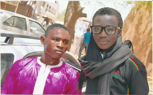 Ouzin Keita pose avec Lamine Pène