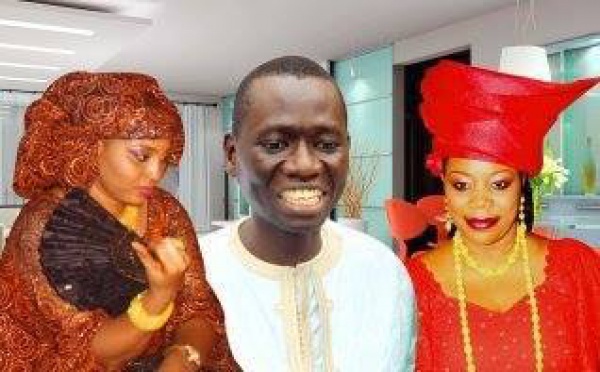 Entouré de ses deux femmes, Serigne Mboup est aux anges