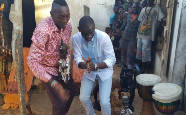 Photos - Pape Diouf au Village artisanal pour tourner le clip "Malaw"