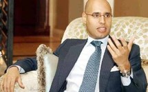 Capture de Seif al-Islam Kadhafi : Première vidéo ! Il est ici enturbanné et portant des lunettes de vue, dans l’avion, qui le transporterait vers la ville de Zintan