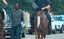 Un prisonnier noir menotté et attaché à une corde: de nouvelles images dévoilées trahissent l’embarras des policiers